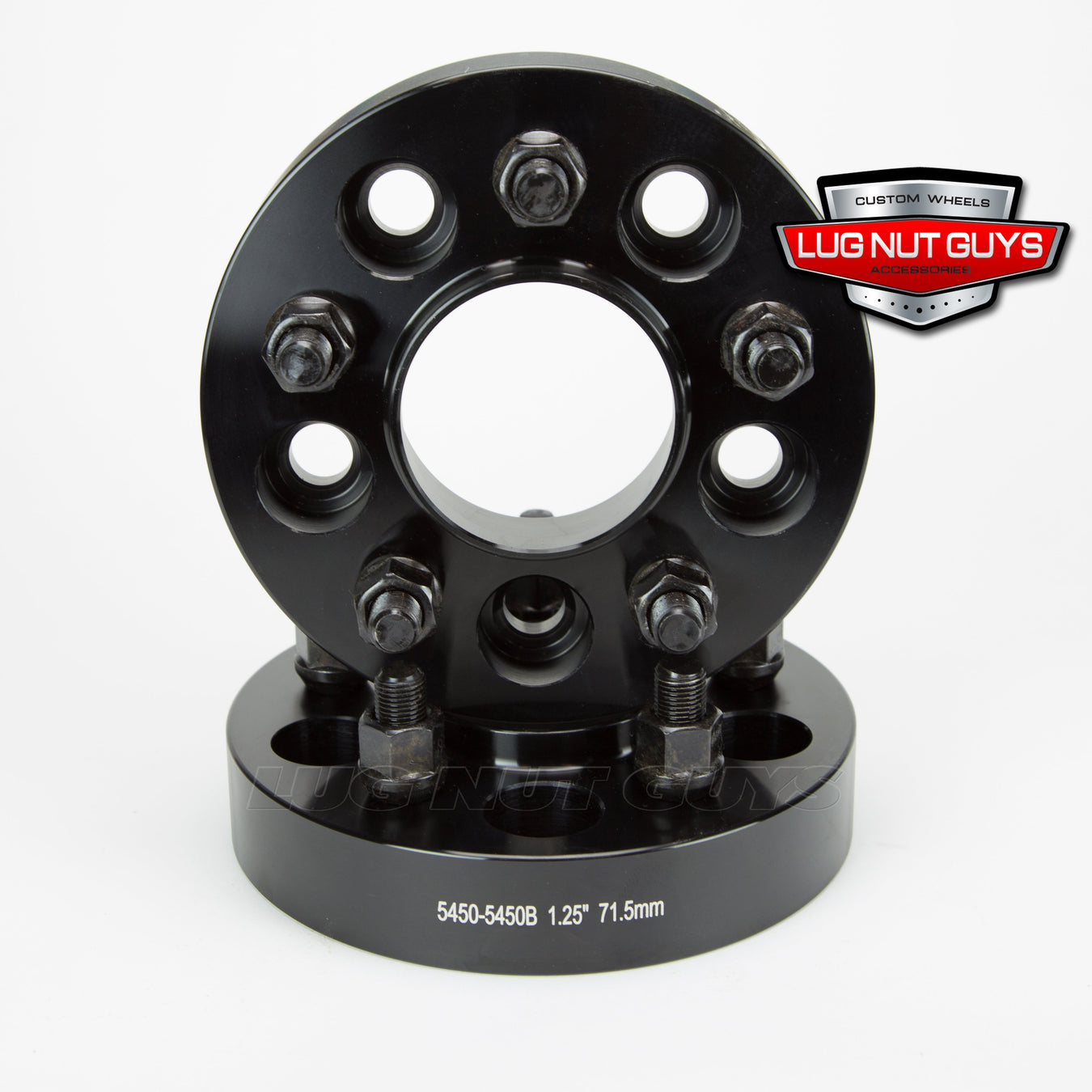 image of two black aluminum wheel adapters that changes Jeep Wrangler TJ or YJ to use Wrangler JL wheels