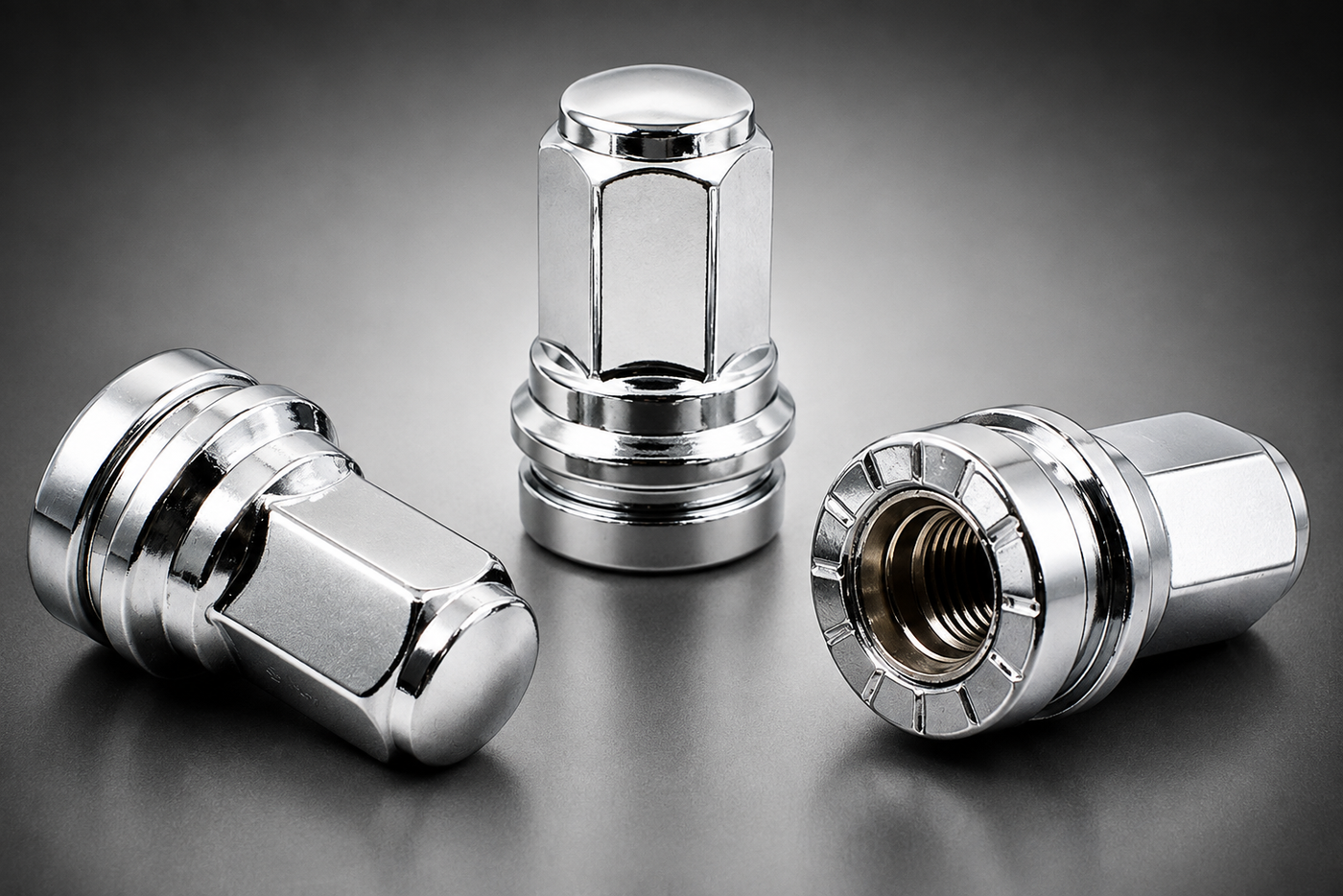 Three shiny chrome lug nuts for Ford F250 & F350 Super Duty trucks, displayed on a dark gray reflective surface, showing different angles of the metal hardware.