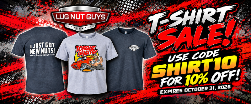 Promotional banner for Lug Nut Guys featuring three t-shirts on a red and black distressed background with sale text reading 'T-Shirt Sale!' and 'Use Code Shirt10 for 10% Off!'. The shirts include a dark navy graphic tee, a light gray graphic tee, and a dark navy plain tee.